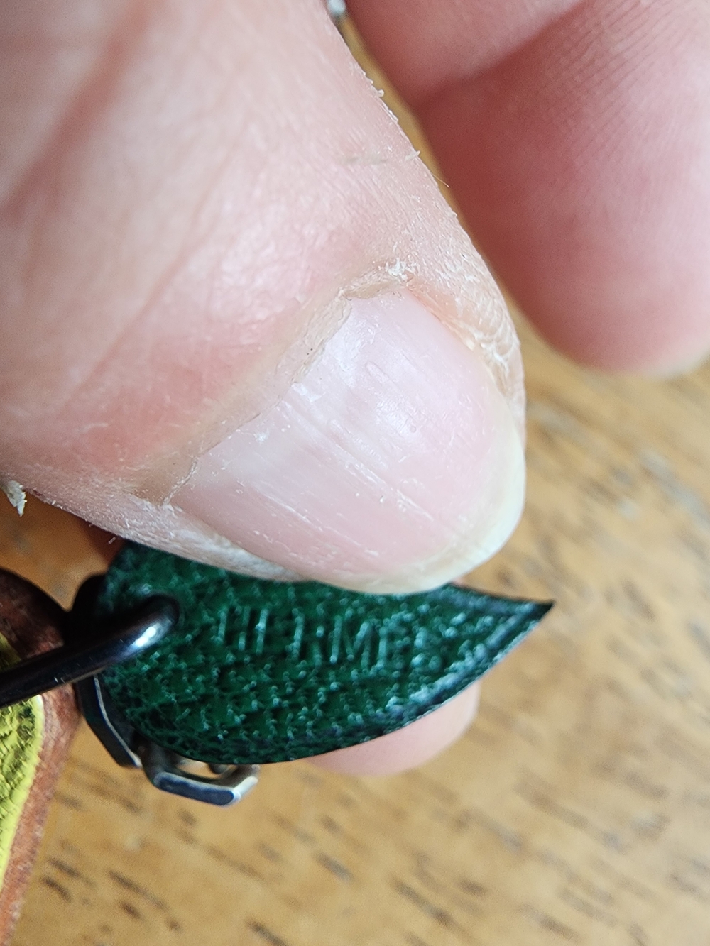 Hermès leather lemon bag charm featuring a green leaf. - Picture 2 of 10